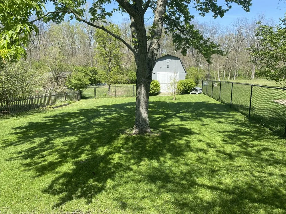 Custom landscape installation in Westfield, IN by Romeros Lawnscaping