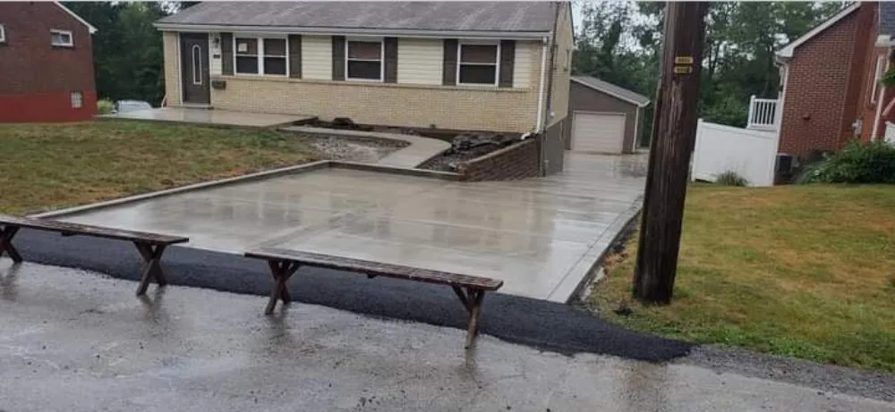 Local lawn mowing service with custom design in Monroeville, PA by Roney Construction