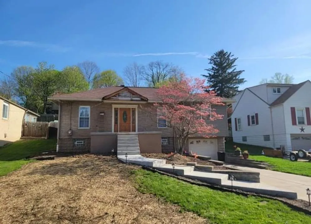 Reliable lawn care service for residential properties in Monroeville, PA by Roney Construction