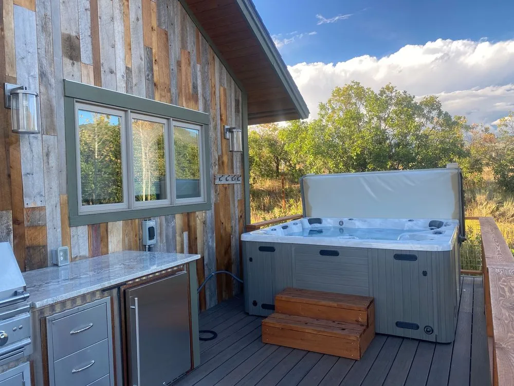 Expert lawn mowing service for year-round maintenance in Denver, CO by Roof Deck and Garden