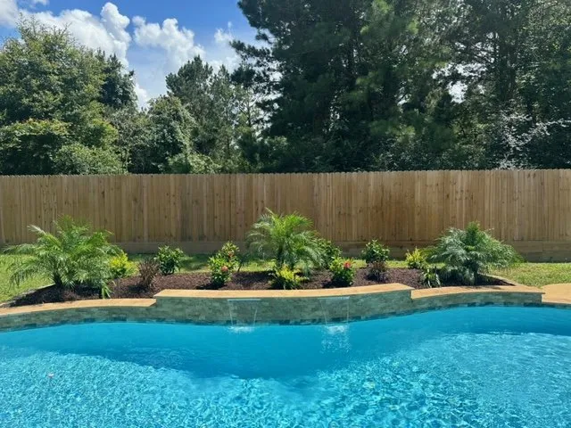 Affordable landscape design for beautiful yards in Tomball, TX by Rooney Residential Services