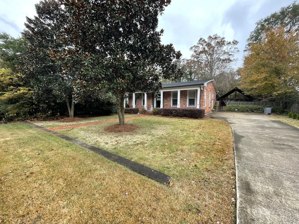 Professional yard cleanup service for residential properties across Anniston, AL - Rooster's Landscape Services