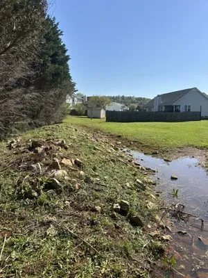 Rooster's Landscape Services Logo