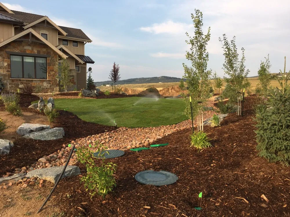 Professional landscape installation near you in Commerce City, CO by Rooted Craftsmen