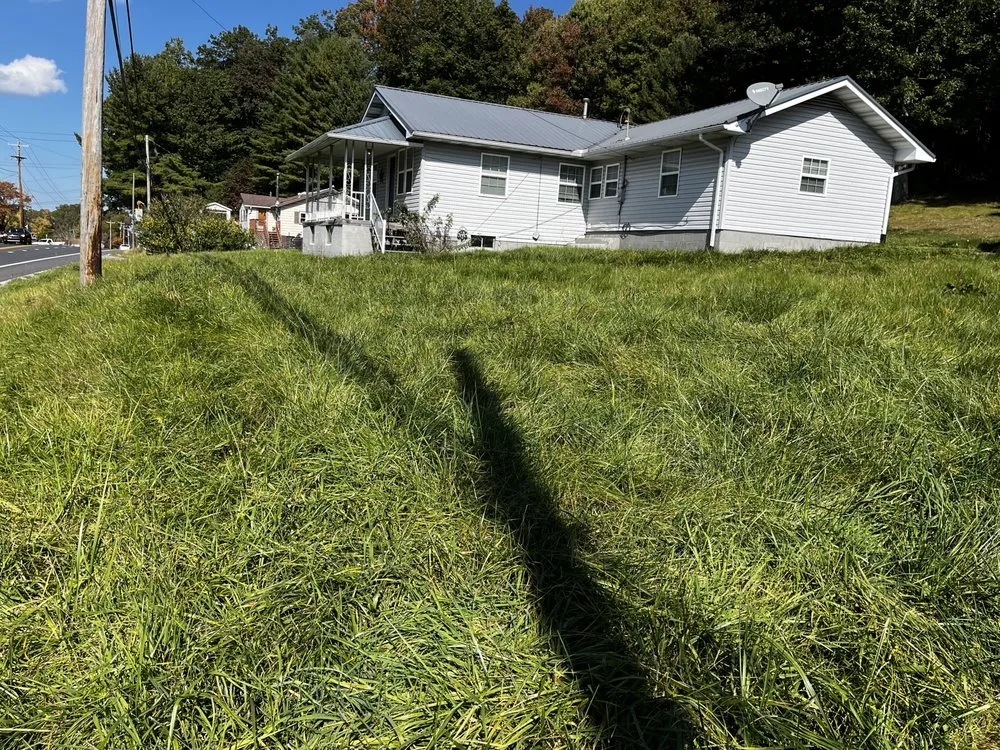 Custom lawn care service for year-round maintenance across Scarbro, WV - Rooted In Christ Lawn Care