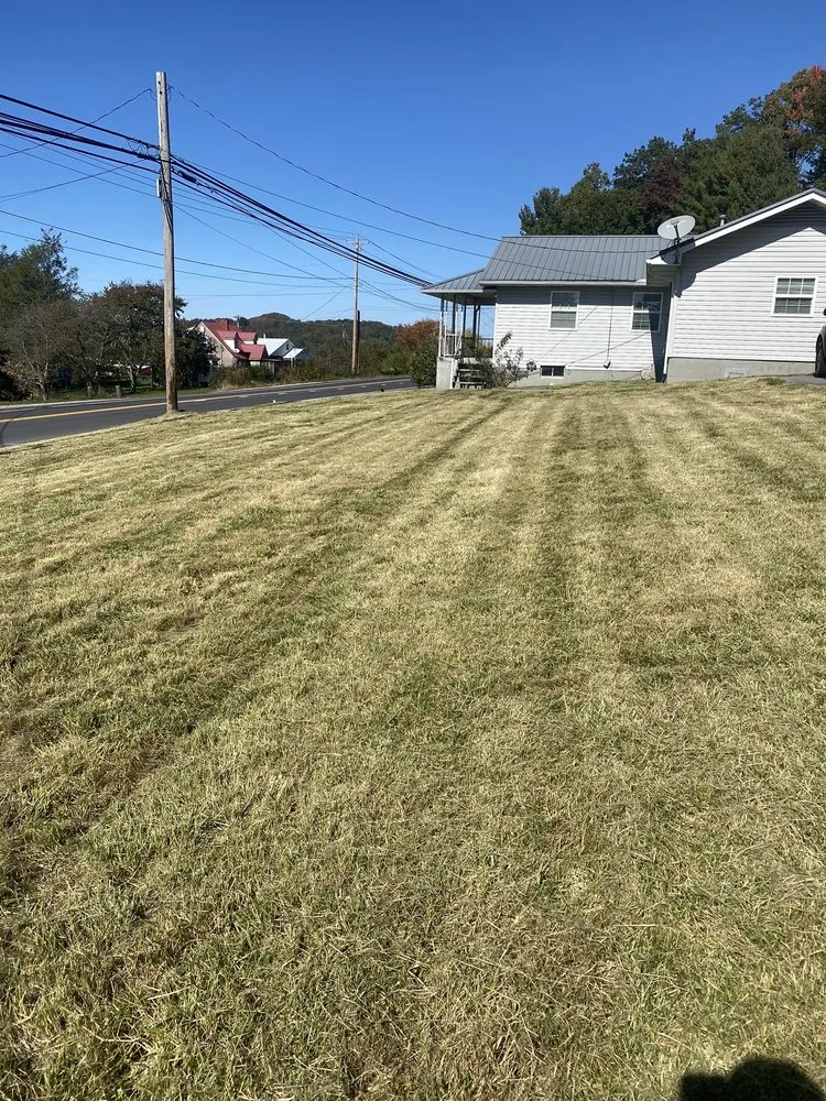 Trusted lawn care service in Scarbro, WV by Rooted In Christ Lawn Care