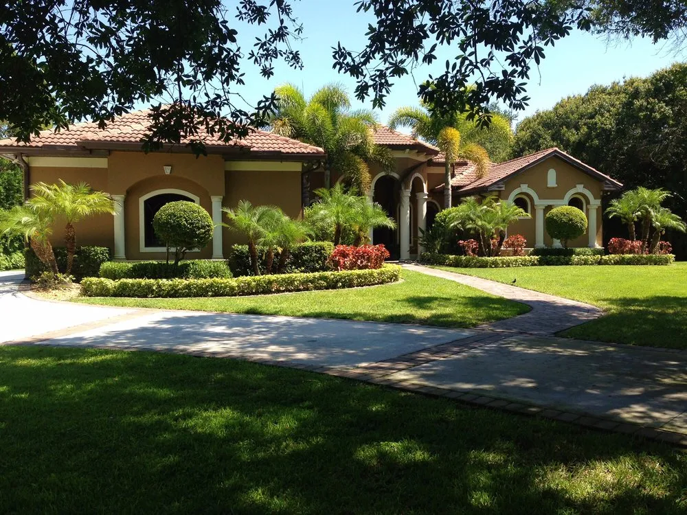 Trusted lawn mowing service for year-round maintenance across Estero, FL - Rooted Landscape