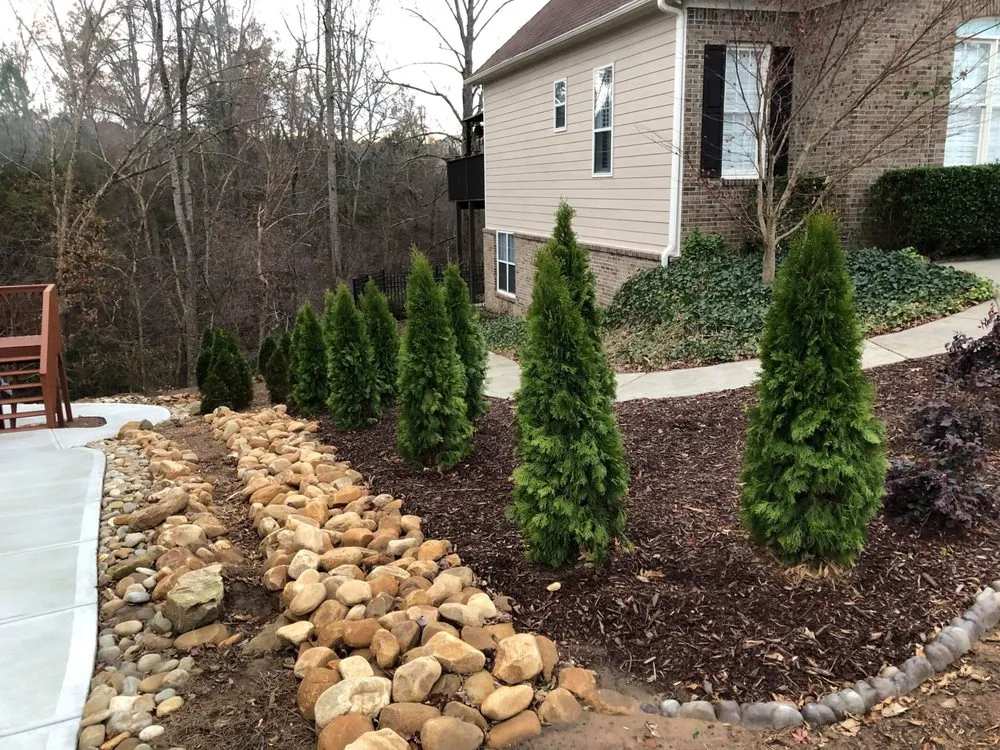 Custom outdoor landscaping for residential properties in Buford, GA by Rooted Landscape Management