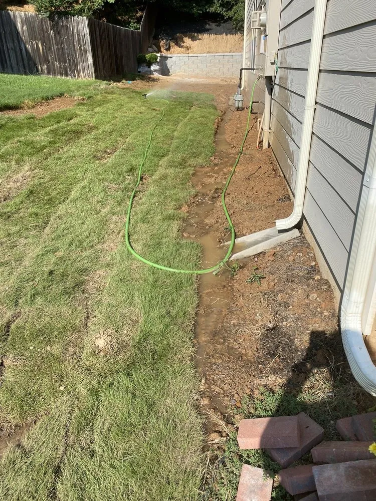 Expert landscape design with custom design in Buford, GA by Rooted Landscape Management