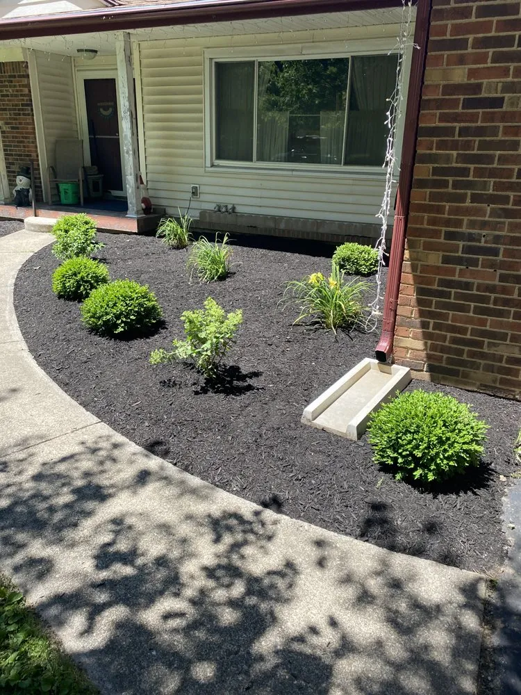 Professional landscape design in Carmel, IN by Rooted Lawn & Landscape