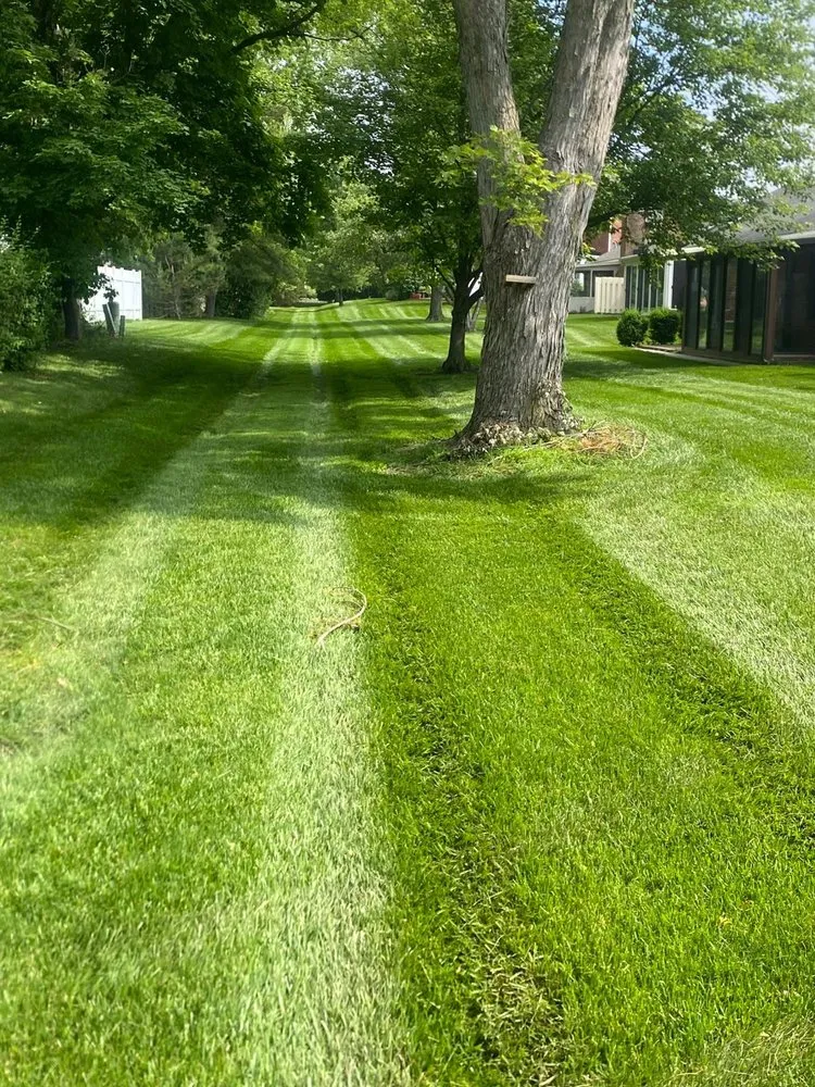Professional outdoor landscaping for beautiful yards in Carmel, IN by Rooted Lawn & Landscape