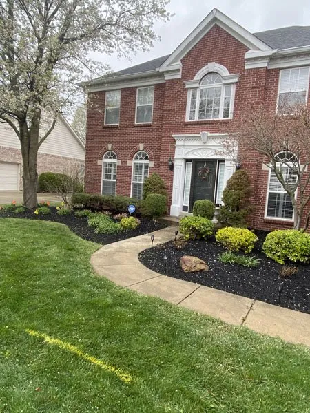 Professional landscape installation for homes in Indianapolis, IN by Rooted Lawn & Landscape
