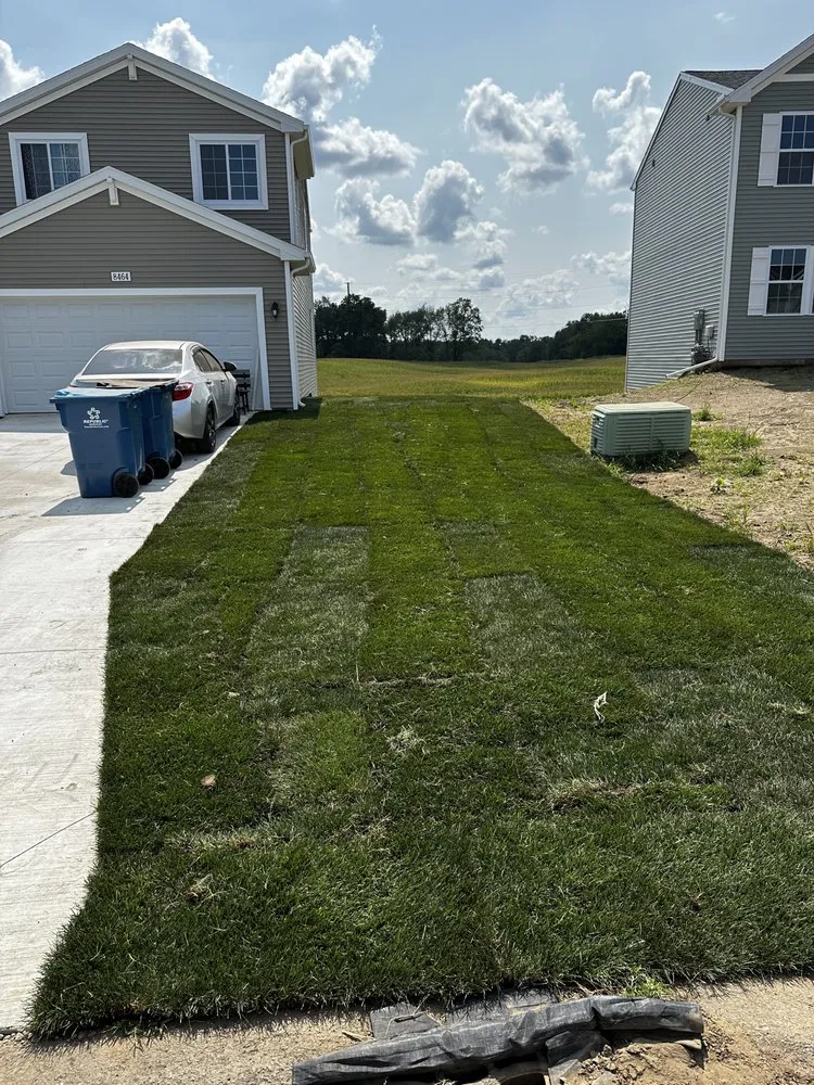 Professional landscape installation in Battle Creek, MI by Rooted Sod