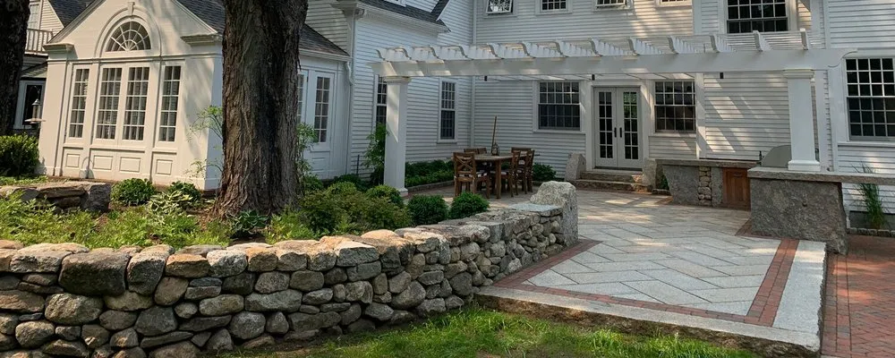 Affordable lawn mowing service in Concord, MA by Roots & Rocks Landscape Artisans