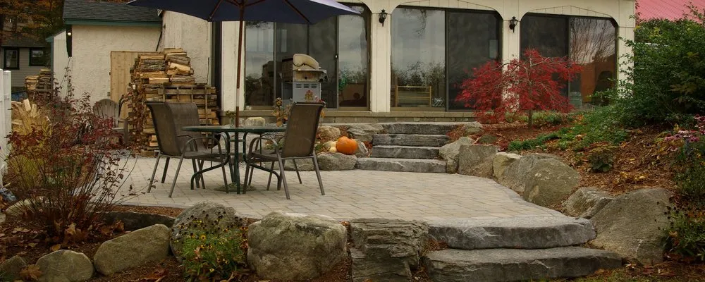 Local yard maintenance for year-round maintenance in Concord, MA by Roots & Rocks Landscape Artisans