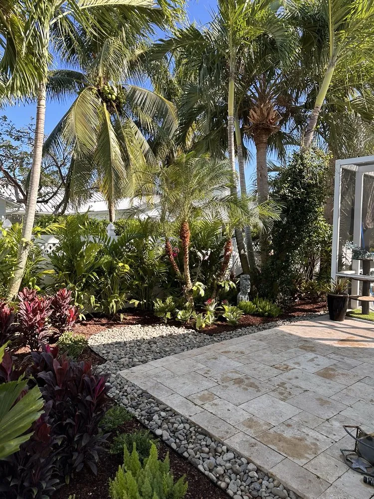 Professional yard maintenance with custom design in Palm Beach Gardens, FL by Roots Landscape Service
