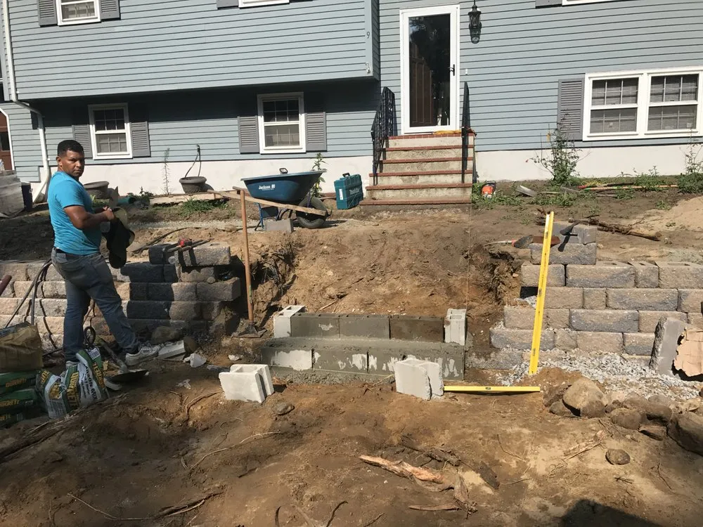 Local outdoor landscaping for homes in Chelmsford, MA by Roots 'n Shoots