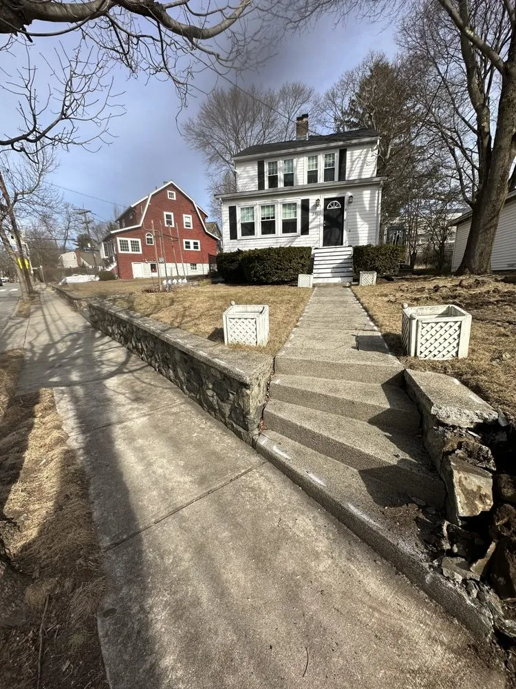 Custom outdoor landscaping in Chelmsford, MA by Roots 'n Shoots