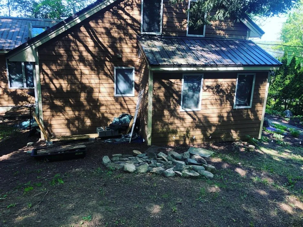 Professional lawn care service in Pownal, ME by Roots Of The Wild Sun