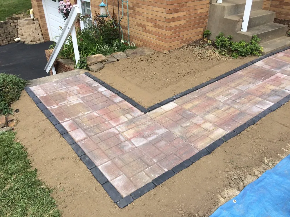 Professional outdoor landscaping for year-round maintenance in North Huntingdon, PA by Roots Property Solutions