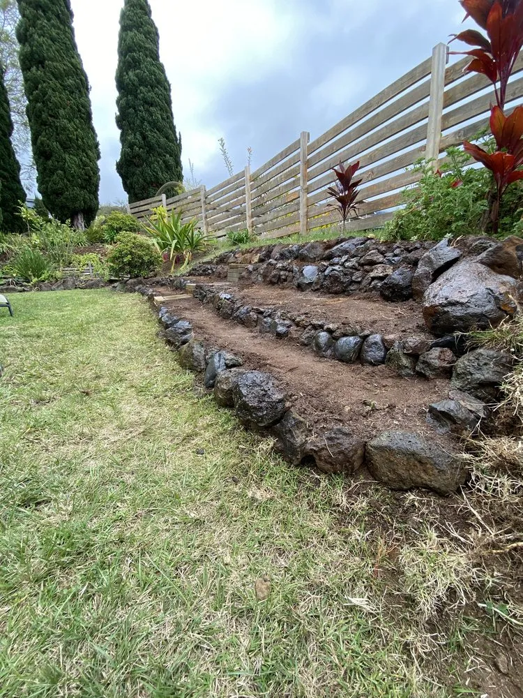Expert lawn mowing service for residential properties in Hilo, HI by Roots to Fruits Landscape and Build