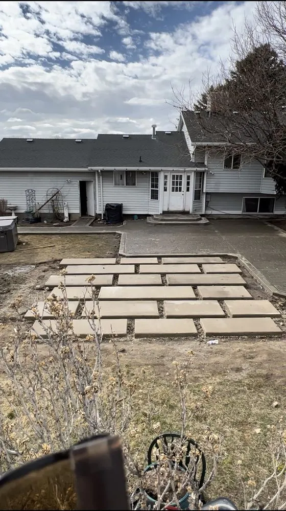 Custom landscape installation for residential properties in Orem, UT by Rosas Construction