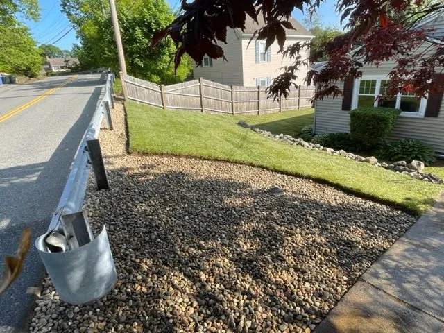 Expert lawn mowing service in Arlington, MA by Rose Landscaping and Construction