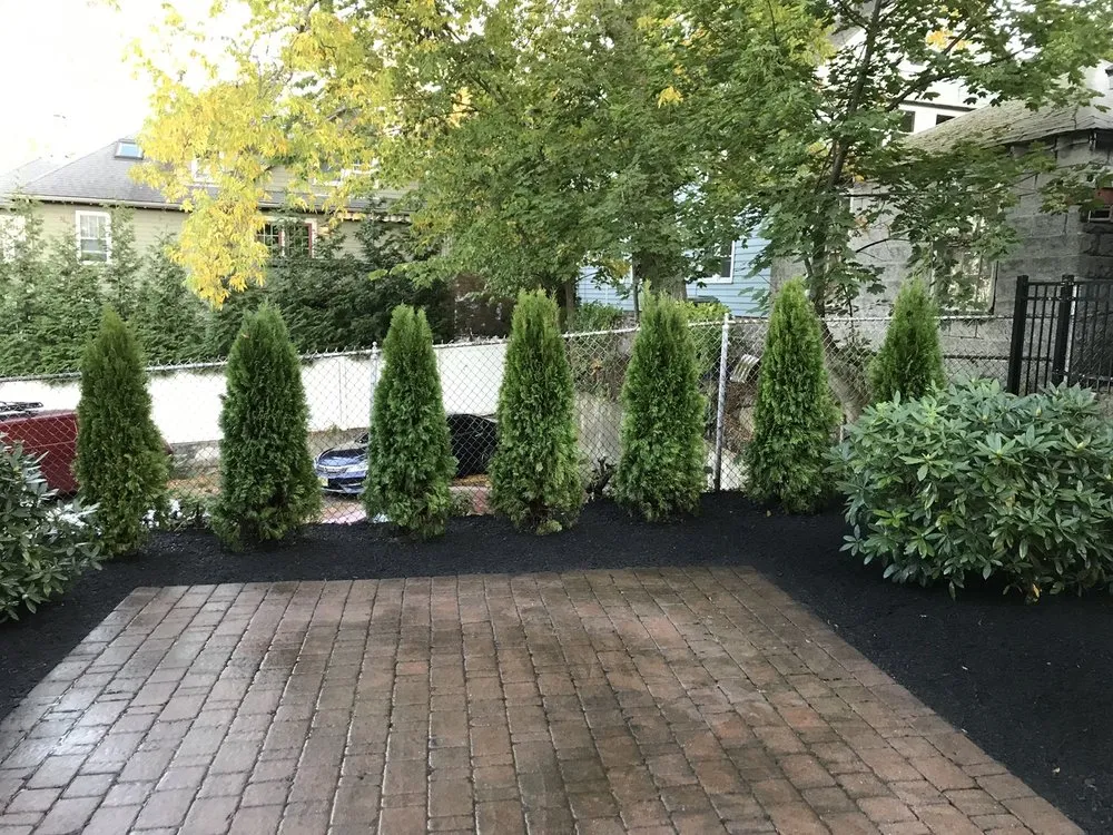 Affordable garden landscaping for year-round maintenance in Arlington, MA by Rose Landscaping and Construction
