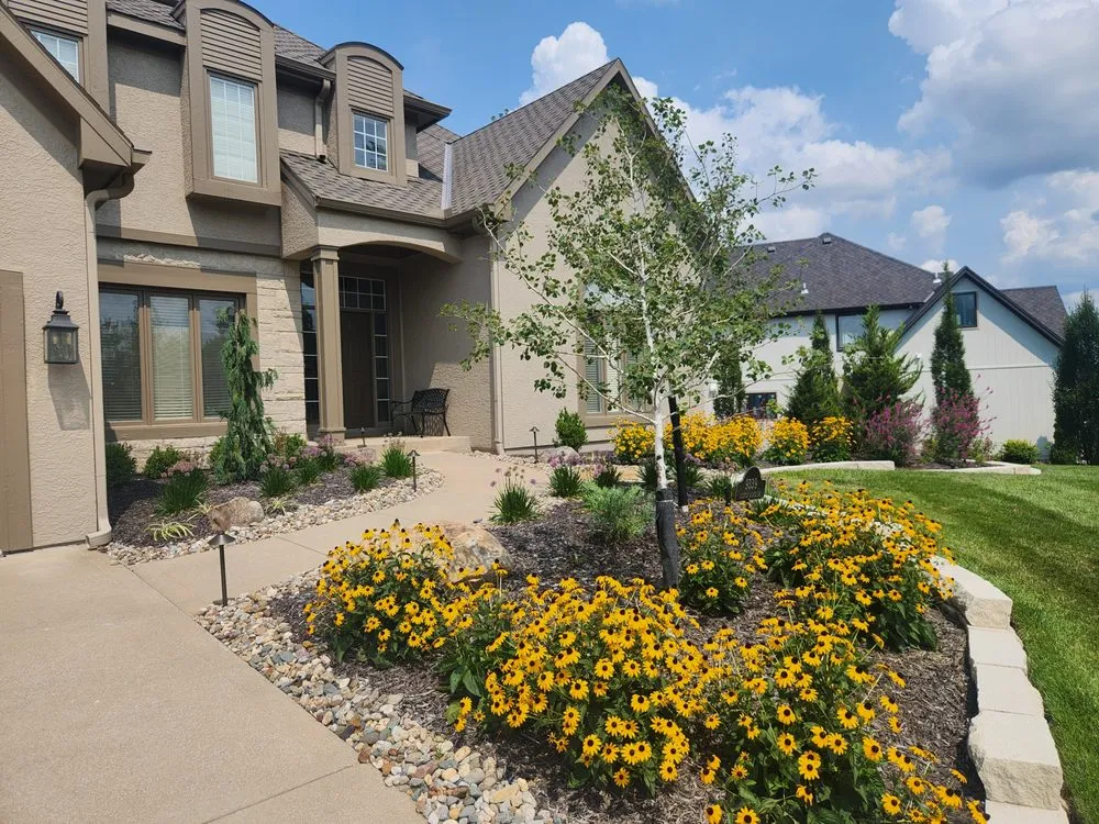 Professional lawn mowing service in Kansas City, MO by Rosehill Gardens