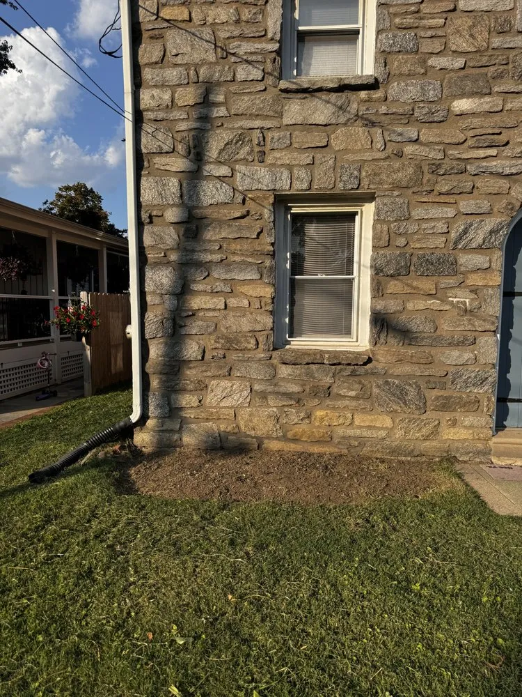 Custom outdoor landscaping with custom design in Norwood, PA by Rosenberger Enterprises