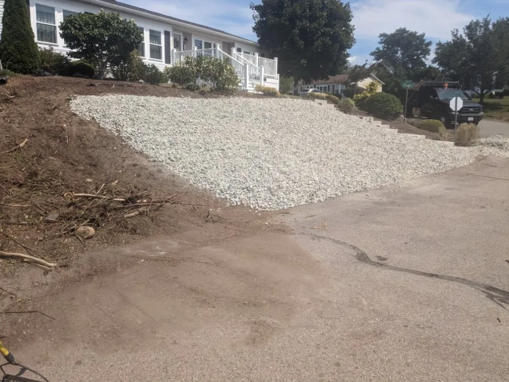 Custom yard cleanup service for year-round maintenance in Barnstable, MA by Rose's Landscaping & Roof cleaning