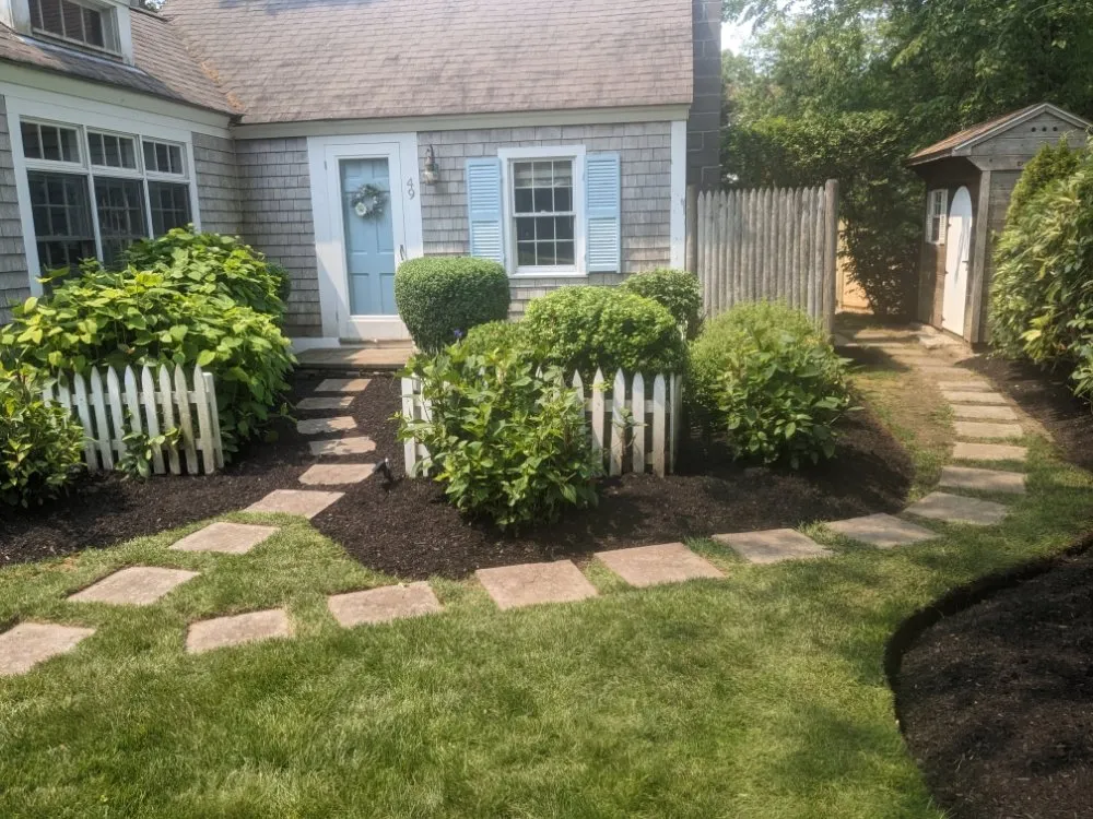 Trusted lawn care service for homes in Barnstable, MA by Rose's Landscaping & Roof cleaning