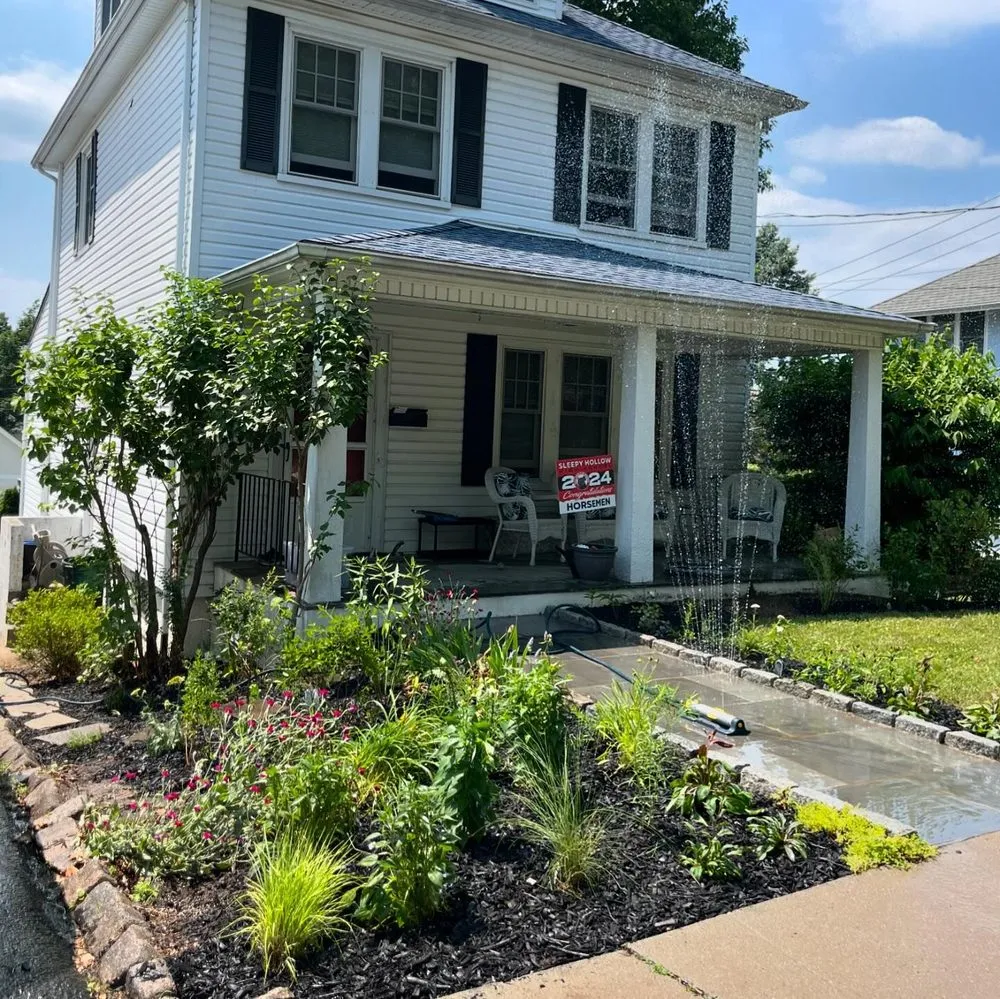 Custom landscape installation in Sleepy Hollow, NY by Rosewater Garden Design