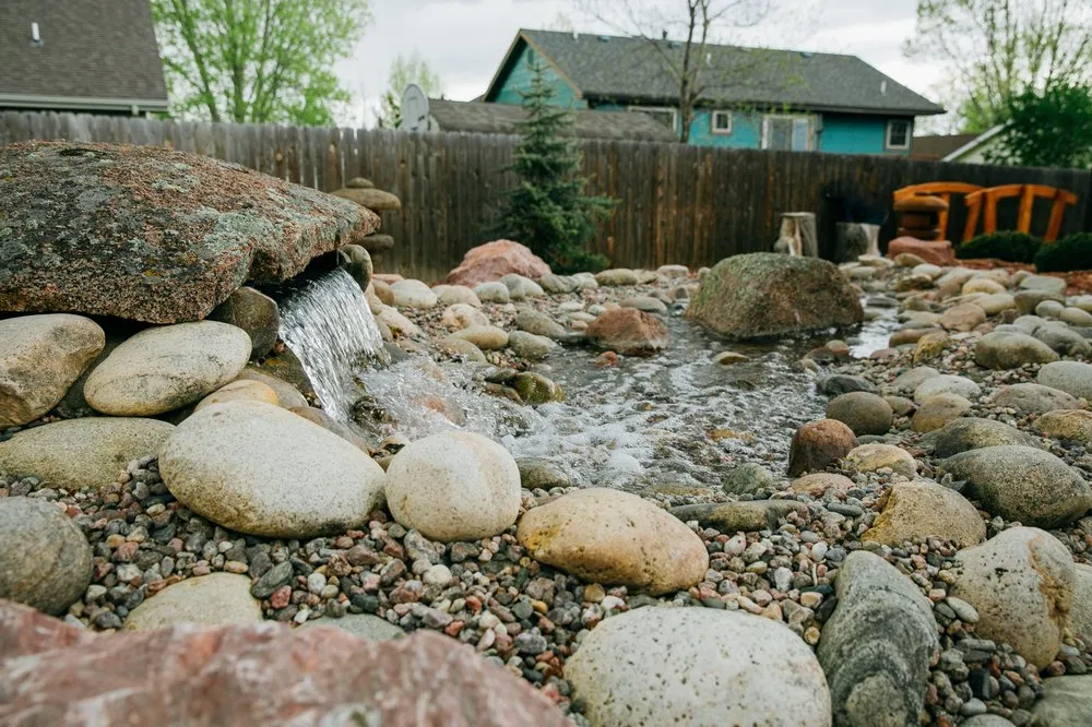 Top-rated lawn mowing service with custom design in Cheyenne, WY by Ross Construction