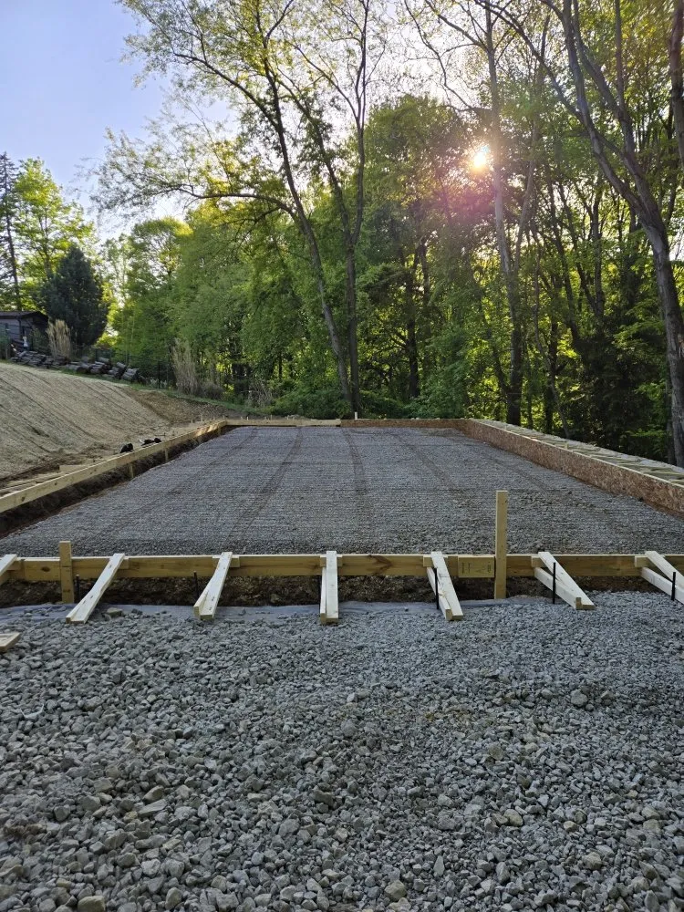 Custom landscape installation in Zelienople, PA by Ross Excavating