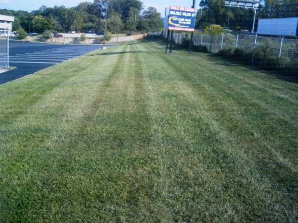 Expert lawn mowing service for outdoor upgrades in Warrington, PA by Rossillo Landscaping