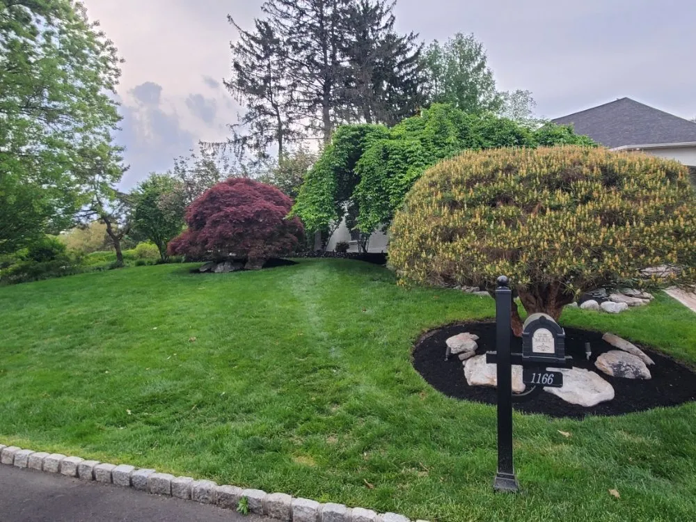 Custom yard cleanup service with custom design in Warrington, PA by Rossillo Landscaping