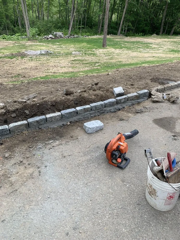 Affordable yard cleanup service for outdoor upgrades in Ridgefield, CT by Rossini Landscaping