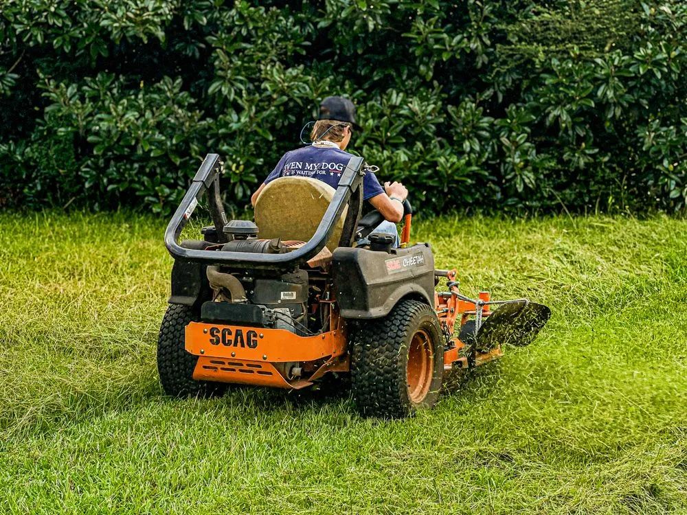 Affordable outdoor landscaping with custom design in Covington, GA by Rough Cut Lawn
