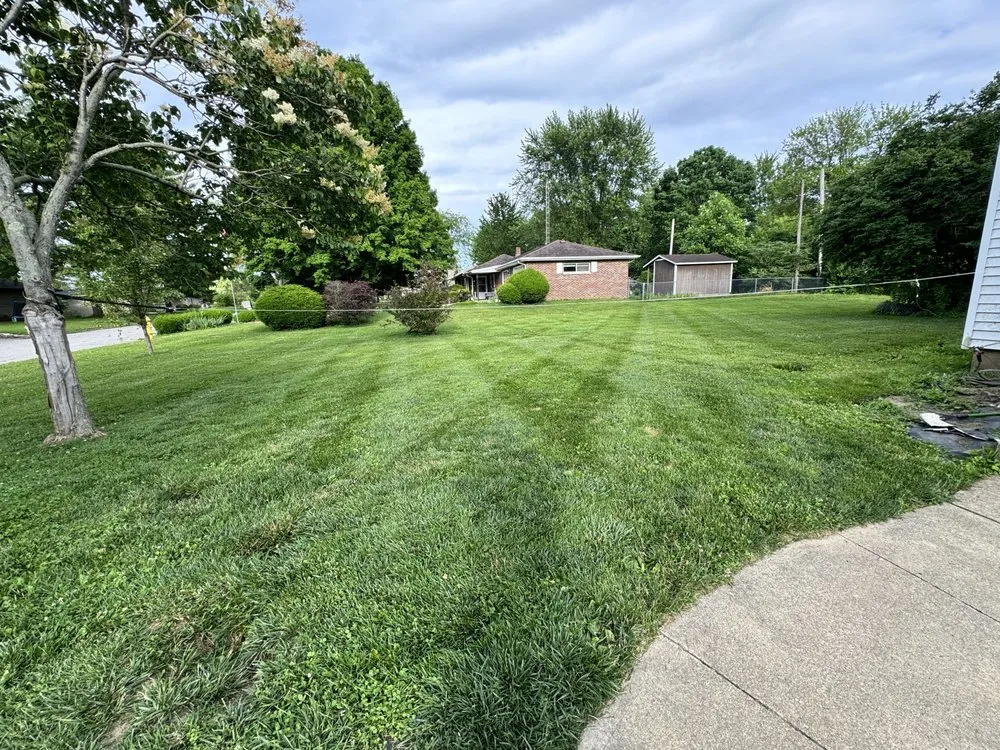 Affordable yard maintenance in Centerville, IN by Rough Edges Lawn Care