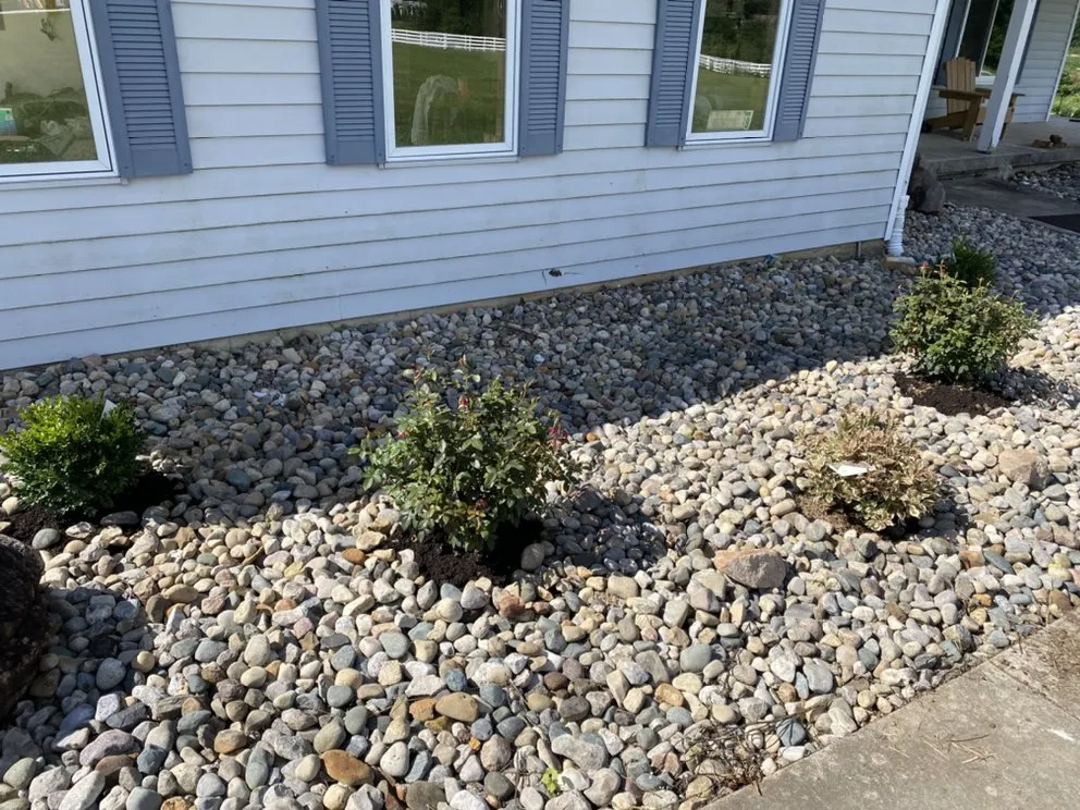 Professional lawn mowing service for year-round maintenance in Fort Wayne, IN by Roush Landscaping and Construction