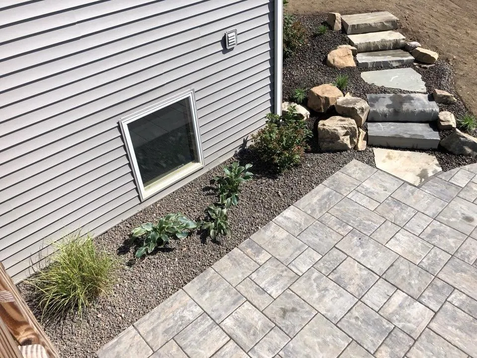 Professional outdoor landscaping for homes in Fort Wayne, IN by Rowan Landscape & Design