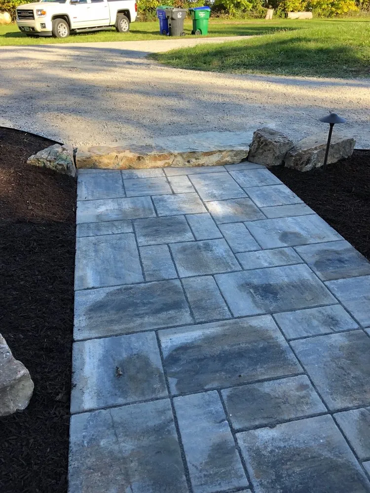 Affordable lawn care service in Fort Wayne, IN by Rowan Landscape & Design