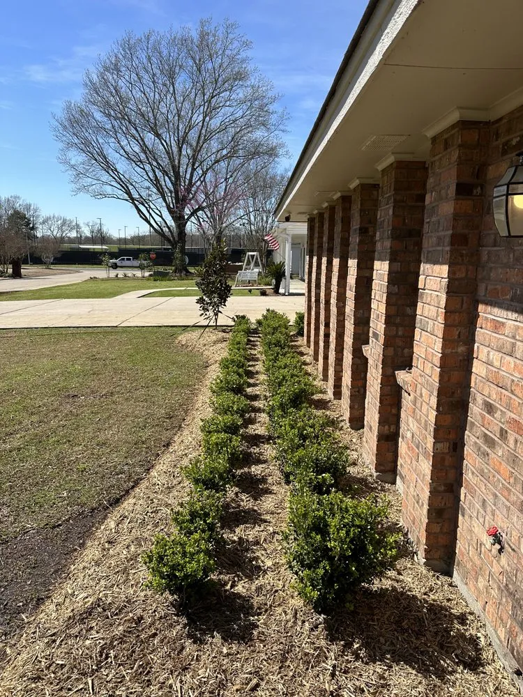 Top-rated garden landscaping with custom design in Monroe, LA by Rowtons Lawn and Landscaping