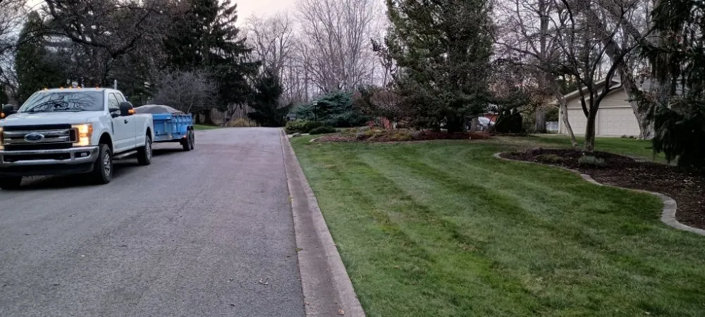 Affordable lawn care service for year-round maintenance in West Chicago, IL by Royal Blue Landscaping