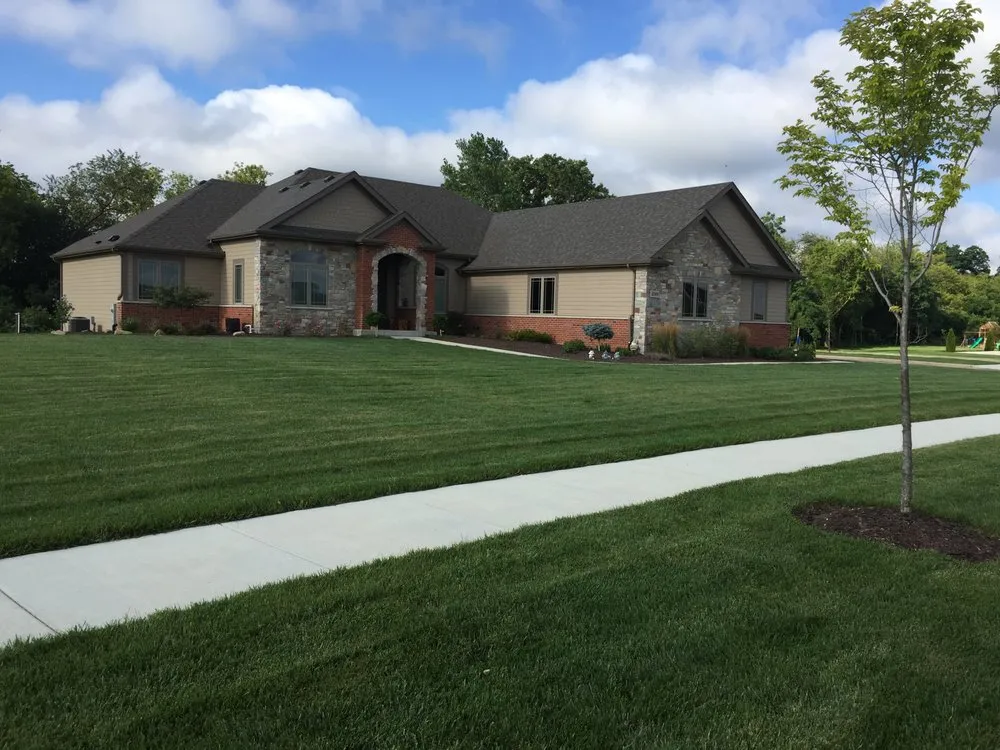Affordable landscape design for residential properties in Kansasville, WI by Royal Green Sod Farm