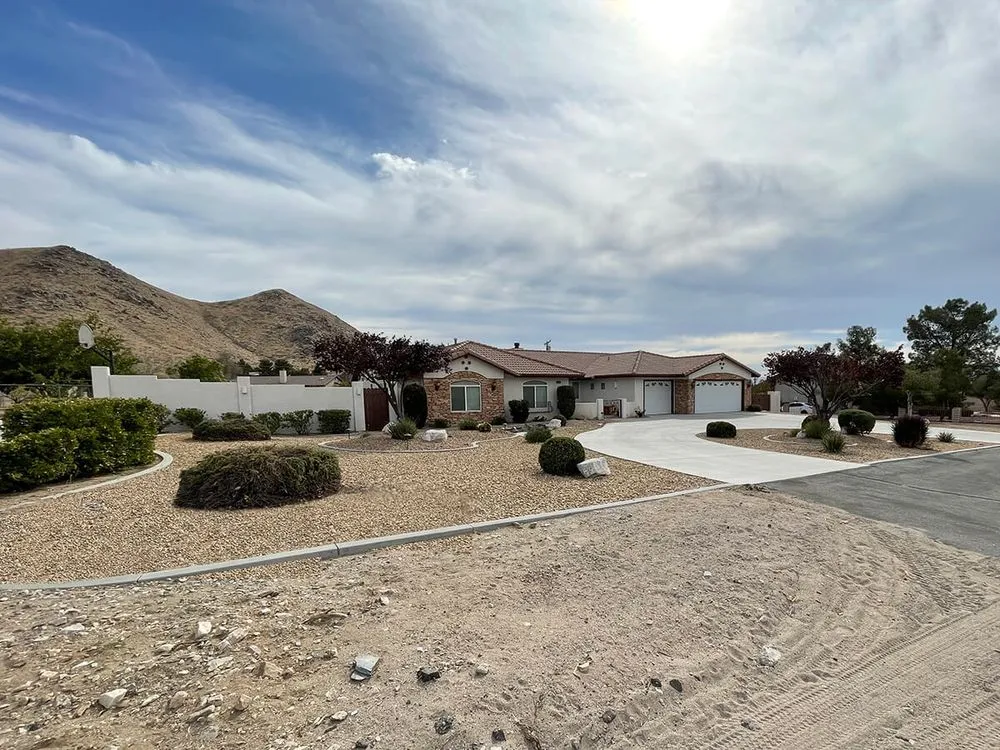 Affordable yard cleanup service for year-round maintenance in Apple Valley, CA by Royal Lawn Maintainance