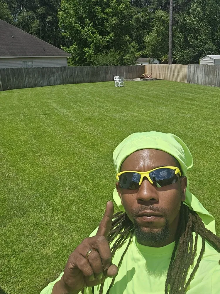 Affordable lawn mowing service for residential properties in Savannah, GA by Royal Rhodes Lawn Service