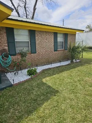 Royal Rhodes Lawn Service Logo