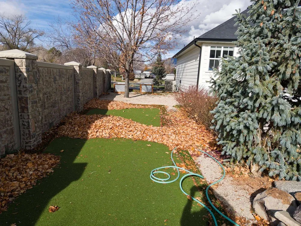 Affordable yard cleanup service for year-round maintenance in Pleasant Grove, UT by Royal Roots Construction